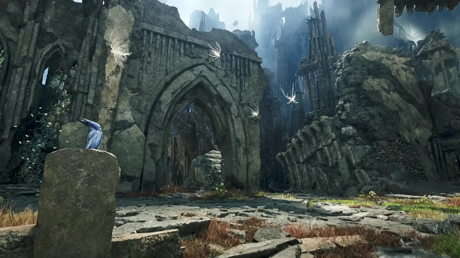 Gothic stone arches and ruins in the Skybound Eyrie with a blue bird perched on a stone post, Monster Hunter Wilds Ascendance