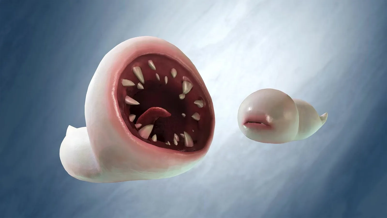 Official Monster Hunter Wilds Ascendance render of two Khezu whelps, one with its round mouth gaping open full of teeth